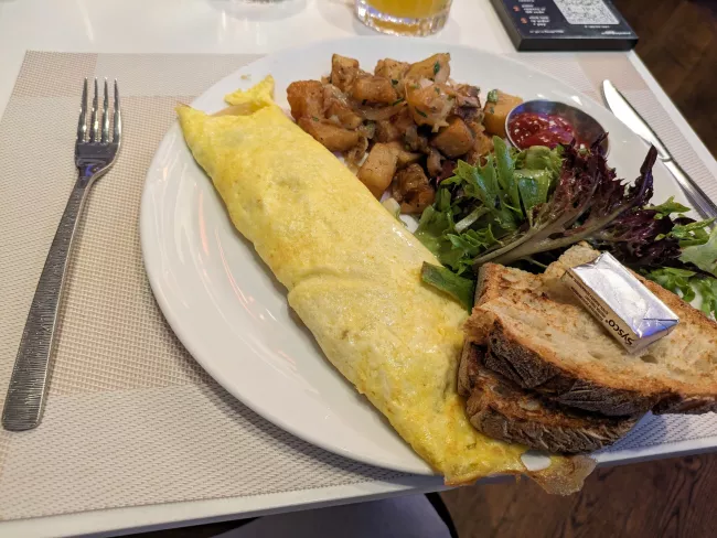 FARM OMELET Caramelized Onions, Mushrooms, Havarti Cheese, Breakfast Potatoes